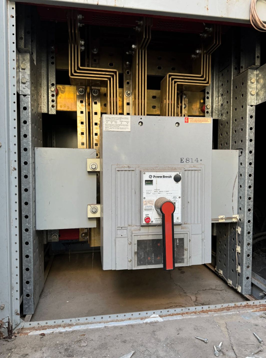 Large commercial main breaker inside electrical gear